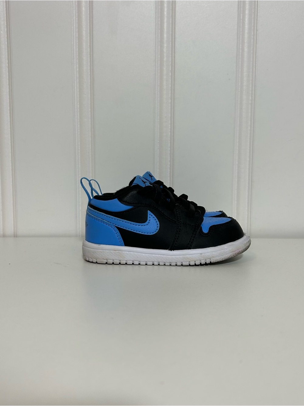 Jordan 1 low crib blue black strap
